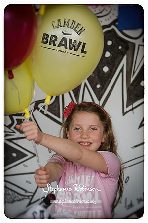 Camden Brawl girl holding balloons