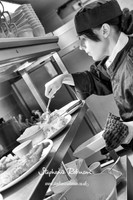 Chef Serving Food in Restaurant